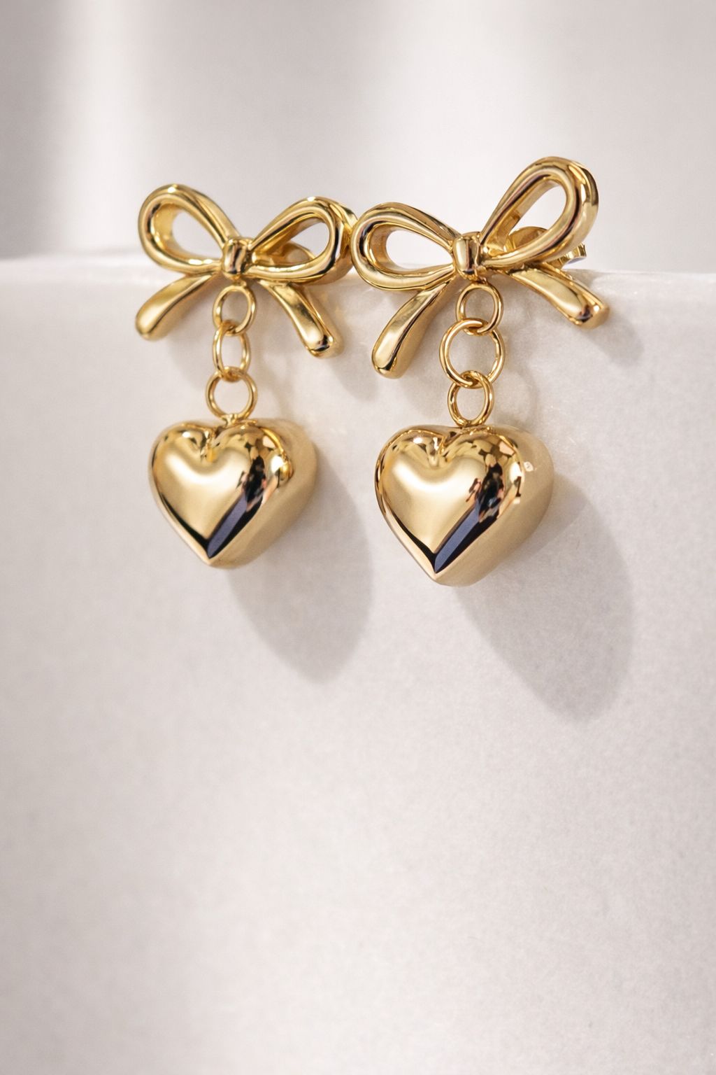 Gold Bow heart earrings